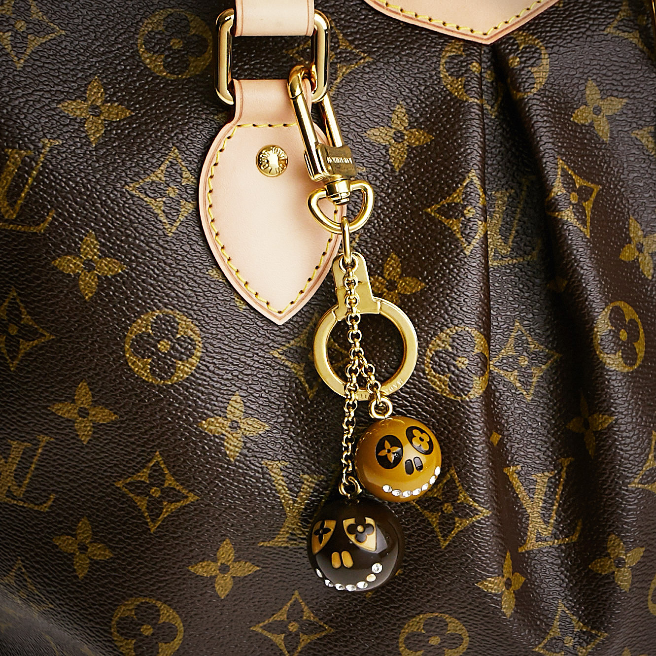 Louis Vuitton Jack and Lucie Skull Bag Charm | Yoogi's Closet Authenticated Pre-Owned Luxury yoogiscloset.com